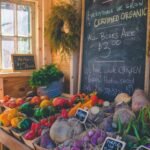 variety of vegetables display with Certified Organic signage